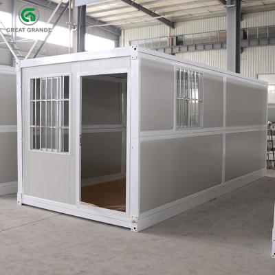 中国 Left Window Steel Prefab Folding Container House For Temporary Housing Camping 販売のため