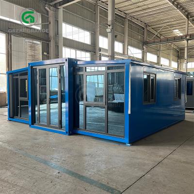 China 20ft Movable Container House Manufacturer Blue Frame Wall Panel Front Wall Glass en venta