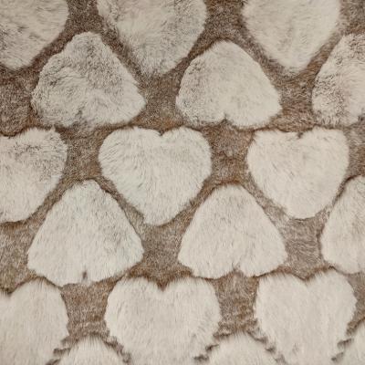 China Polyester Faux Fur Fabric 370 Gsm With Love Pattern Sheared For Pillow Blanket for sale