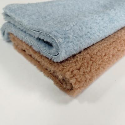 China 390gsm Polyester Sherpa Fleece Fabric for sale