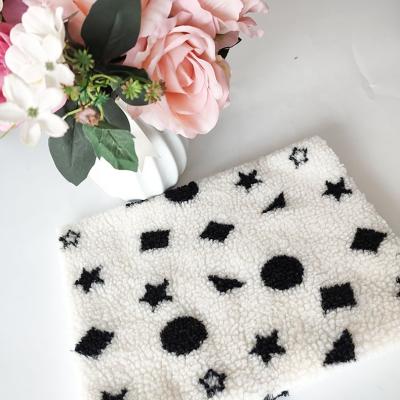 China Black And White Sherpa Fleece Fabric Jacquard Yarn Dyed For Backoack Floor Mats Pillow for sale