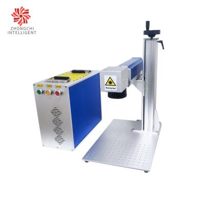China 70W 100W Desktop Laser Marking Machine Fiber Laser Engraver for sale