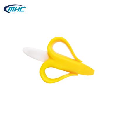 Chine La brosse à dents molle Teether de banane de Teether de bébé non toxique de silicone a adapté aux besoins du client à vendre