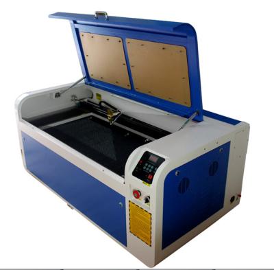 Chine Machine de gravure de laser de commande numérique par ordinateur de CO2 pour le métal en cristal en verre en bois en cuir acrylique à vendre