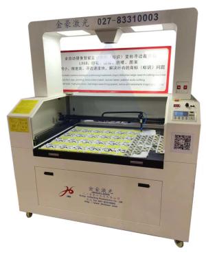China Laser cutting machine for Label Logo Trademark irregular label, printed label, electronic panel, mask, textile brand, wo for sale