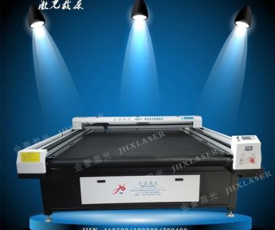 China Flat Bed Laser Cutting Bed Auto Feed Carpet Laser Engraver Bed Te koop