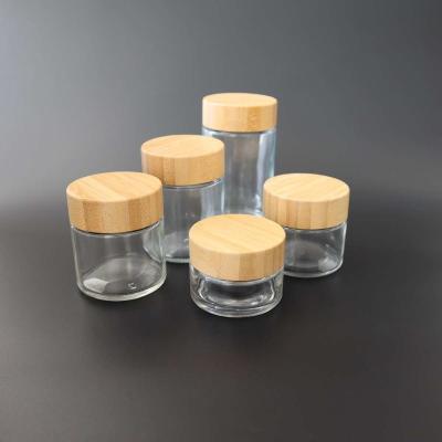 China frasco do vidro de bambu de vidro da tampa da prova da criança do frasco do esconderijo da erva daninha 2-6oz 8o à venda