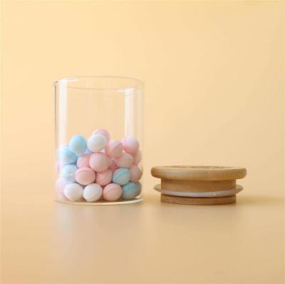 China 3oz Wood Suction Lid Borosilicate Glass Jar Canister For Storage Display for sale