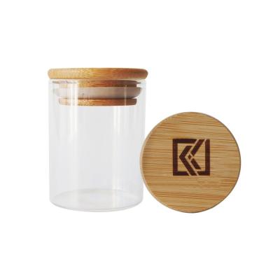 China 2oz 3oz Wood Lid Borosilicate Glass Jar For Weed Dry Products for sale