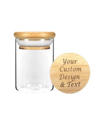 Cina Bottone di vetro trasparente, trasparente e ad alto borosilicato, con coperchio in legno di bambù in vendita