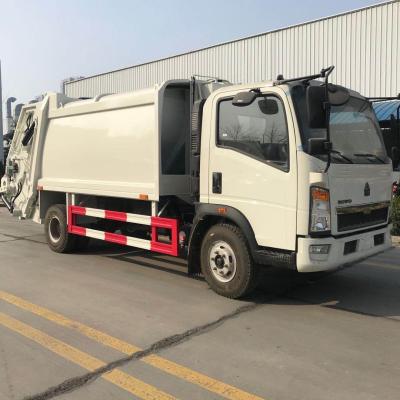 China Hot Selling Used SINOTRUK HOWO 4x2 Compression Garbage Truck for sale