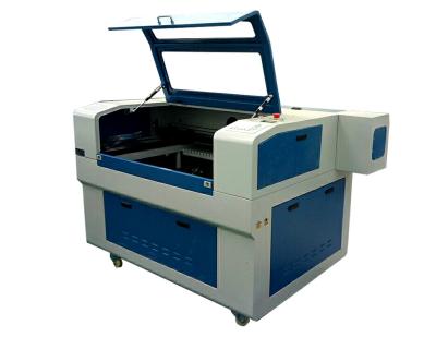 China Acrylic Stone Glass Rubber CO2 Laser Engraving Machine Co2 Laser Cutter for sale