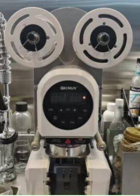 China Máquina de sellado de vasos de agua de motor sin cepillo de papel plástico completamente automática en venta