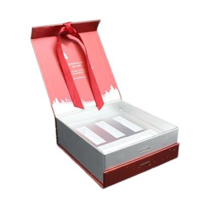 China OEM Flap Lid Magnetic Rigid Gift Box With Ribbon And EVA Insert for sale