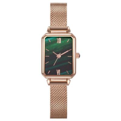 China El cuarzo minimalista crea los relojes para requisitos particulares Mesh Band impermeable en venta