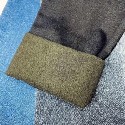 中国 TianSLの極度の伸張の綿のブレンドは12のOzデニムの生地にジーンズのためのブラシをかけた 販売のため