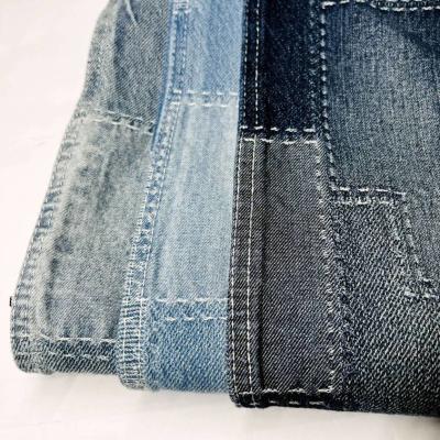 China Cotton Blend Stitching Lattice Jacquard Denim Fabric Jean Material Fabric For Garments for sale