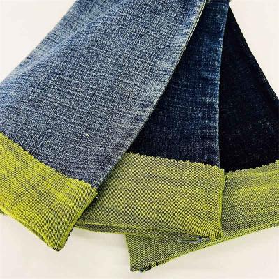 Китай Sanforized Stretchy правая джинсовая ткань Twill с желтой задней стороной продается