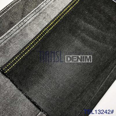 中国 170CM 340gsmはズボンのジャケット スカートおよび袋のための100%の綿のデニムの生地を洗浄した 販売のため
