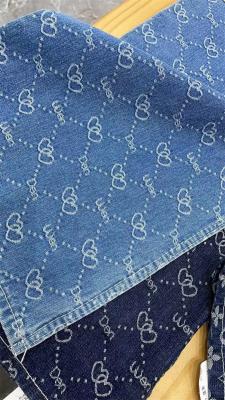 China el azul del algodón 12oz modeló la tela del jean elastizado para los vaqueros 71inch de los pantalones en venta