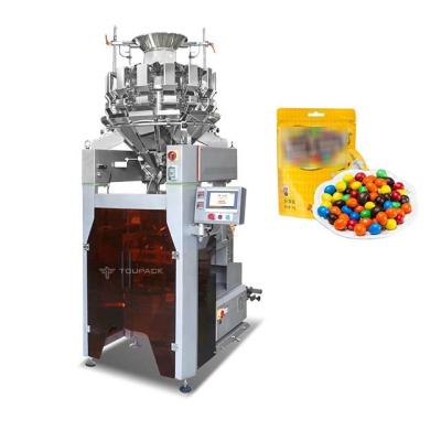 China Chocolate Candy Soft Sweets Weighing And Packing Machine Cover Small Area 120BPM Filling Machine for sale