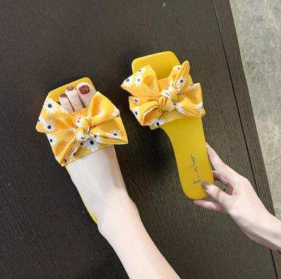 China 2021 Fashion Trend Cheap Summer Ladies Flat Beach Slides Outdoor Bowknot Floral Women's Sandals Slippers Fashionable for sale