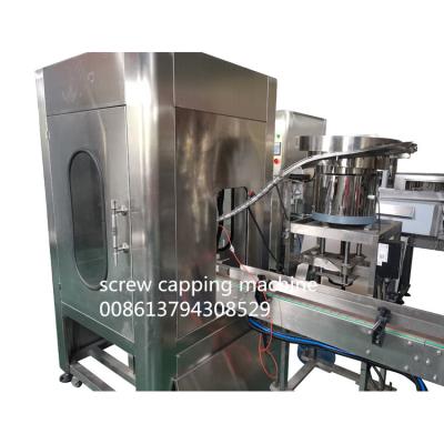 China 2000pcs/Hour Automatic Screw Capping Machine With Conveyor Belt for sale