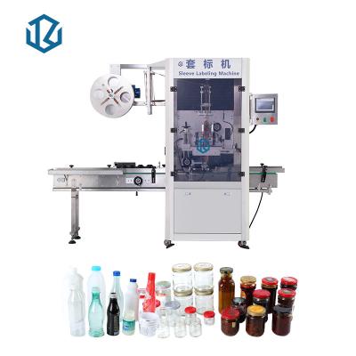 China Tins Cans Shrink Sleeve Labeling Machine Automatic Round Bottles Shrink Sleeve Applicator for sale