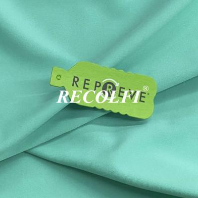 China Activewear cepillado hecho de desgaste de ciclo reciclado del sujetador plástico del deporte en venta
