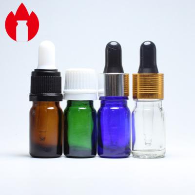 China Colorful Dropeer Cap 5ml Essential Oil Glass Bottle for sale