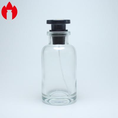China 100ml Clear Perfume Moulded Glass Bottles With Pump Spray for sale