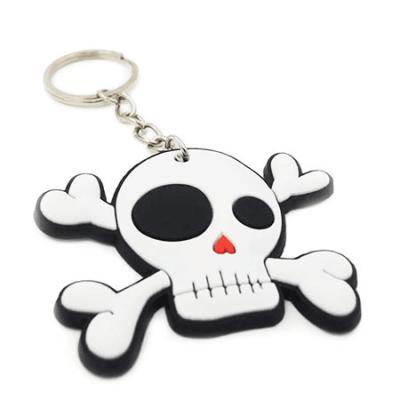 China Custom Size PMS Color PVC Rubber Keyring Skull Rubber Silicone Keychain for sale