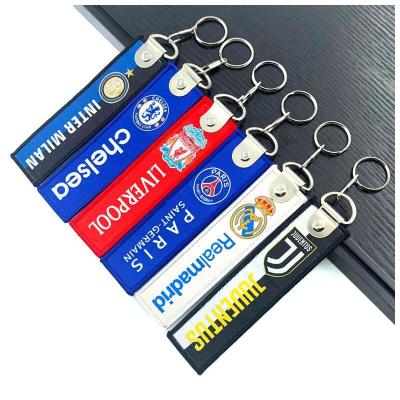 China Polyester Fabric Embroidery Woven Flight Tag Keychain Heat Sublimation Jet Tag for sale