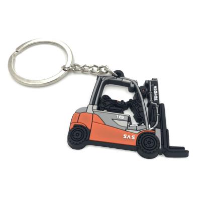 China 2D 3D PMS Soft PVC Rubber Keychains  Custom Car Logo Forklifts for sale