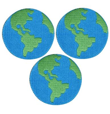 中国 Custom Planet Earth World Iron On Embroidered Badge Patches Blue Merrow Border 販売のため