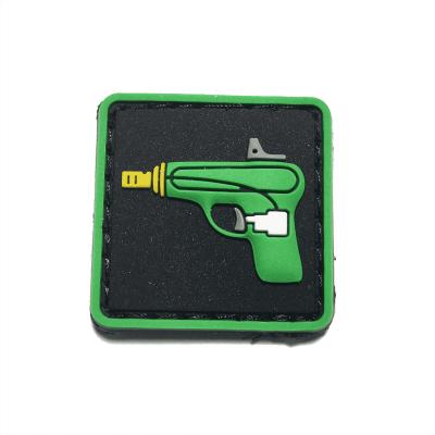 China Custom Made Rubber Patches Enhanced Emoji Water Pistol 3D PVC Patch for sale