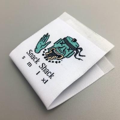China Center Fold Custom Clothing Labels Woven Laser Cut Border for sale