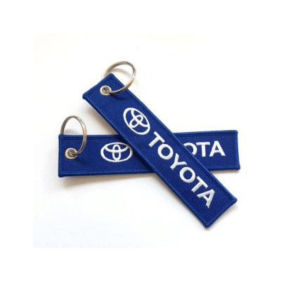 China Toyota Custom Keychain Embroidery Double Side Car Gift Custom Logo Embroidery Key Chain for sale