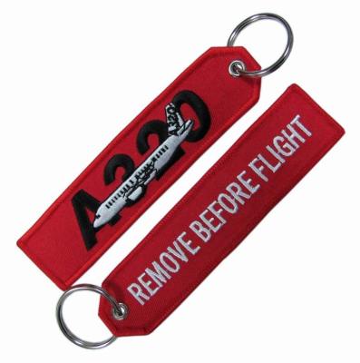 China Twill Embroidered Keychain Shrink Proof Merrowed Border Customized Logo for sale