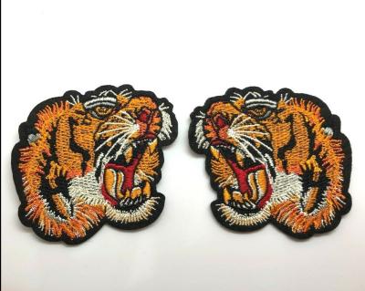 China Merrow Border Embroidered Tiger Patch Twill Fabric Iron On Applique Patch for sale