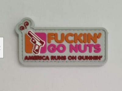 China Dunkin Donut Go Nuts 3D PVC Tactical Patch Pink Hook And Loop Morale Patches for sale