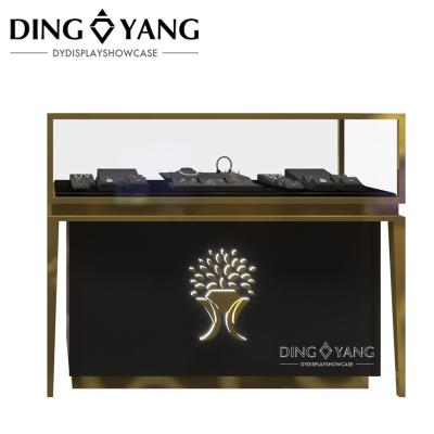 Cina Vitrina di gioielli personalizzati, spazzola di acciaio inossidabile dorato corrispondenza stoarge di legno nero, con il logo del marchio di illuminazione in vendita