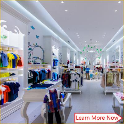 China Customized nice design fashion white wooden kids clothing store interior design,kids baby shop design decoration zu verkaufen