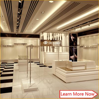 China Custom high quality retail shop display racks/shop furniture garment display/garment shop display en venta