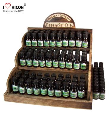 China Counter Display Rack Fragrance Wooden Essential Oil Display Rack for sale