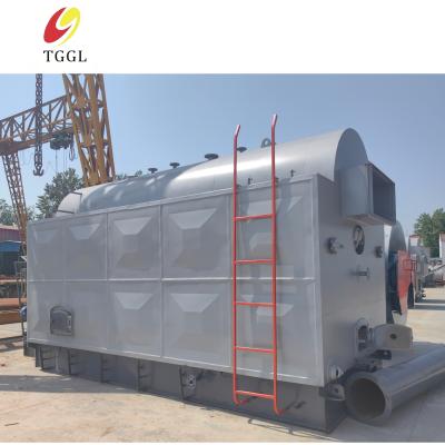 China 0.5-4t/H Caldera de vapor de biomasa alimentada con carbón Caldera manual de parrilla fija en venta