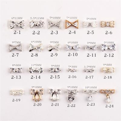 China Decoration Flexible Press On Rhinestones Cute Jewelry Art Decoration Diy Charms Nail Art Zircon Gold Alloy 3d Nails for sale