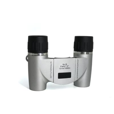 China Silberne Farbe 7x18 Hollyview Mini Pocket Folding Roof Binoculars für Kindererwachsene zu verkaufen