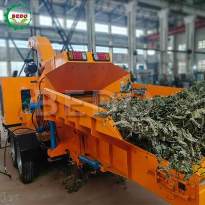 China Sterk vermogen zelfvoedende tuin afval bladeren boomtak Shredder machine Te koop