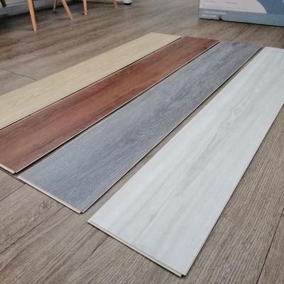 China CE Certified Spc Plank Wood Grain Stone Plastic Composite Flooring ISO14001 Compliant for sale